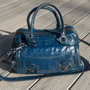 Coach; Navy Blue Patent Leather; Medium; Push Lock; Poppy Satchel; Minor Wear